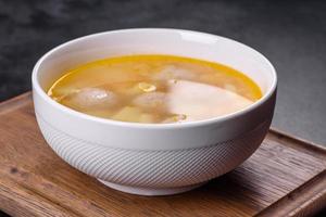 Soup with turkey meatballs, potatoes and vegetables. Selective focus photo