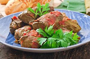 Dolma, stuffed grape leaves, turkish and greek cuisine photo