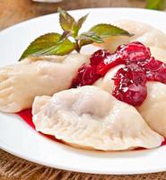 Cherry dumplings with mint photo