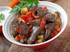 Roast chicken liver with vegetables photo