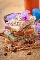 Natural soap on wooden background photo