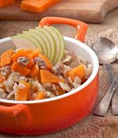 Oatmeal with pumpkin, apples, nuts and honey