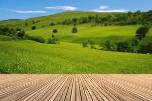 Empty wooden table with mountain view or natural wood table. photo