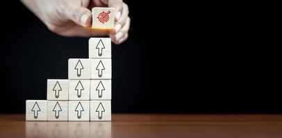 hand stack woods block step on table with icon Action plan, Goal and target, success and business target concept, project management. photo