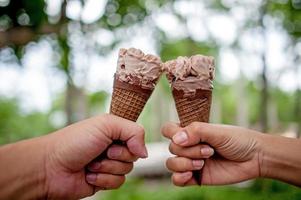 Hand pictures and chocolate ice cream, food concept with copy space photo