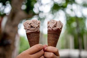 Hand pictures and chocolate ice cream, food concept with copy space photo