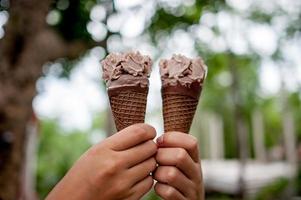 Hand pictures and chocolate ice cream, food concept with copy space