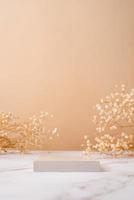 A minimalistic scene of a podium with gypsophila flowers on a light beige background photo