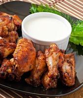 Baked chicken wings in the Asian style photo