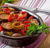 Steamed vegetables - eggplant, peppers and tomatoes photo