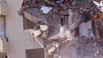 Hydraulic Breaker And Column Cutter Excavator Rear Machine Working in the Demolition of Old Apartment Houses video