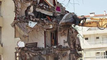 Excavator Removing Columns Of A Collapsed House video