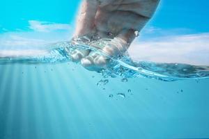 blue sea waves stopped steaming with separate bubbles on a white background. Popular corners, natural concepts photo