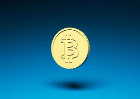 Yellow bitcoin coin on a blue background photo