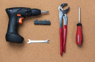 many handy tools, on wooden background top view with copy space for text, Labor day background photo