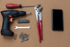 many handy tools, on wooden background top view with copy space for text, Labor day background photo