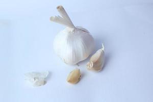 Garlic bulbs on white background, nice picture. Organic garlic top view. Food background. Selective focus. photo