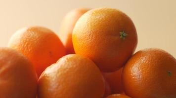 close up of slice of orange fruits in a bowl video