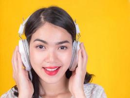 Asian girls are happy to relax by listening to music