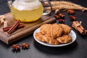 Homemade corn cookies on a dark concrete background photo