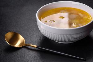 Soup with turkey meatballs, potatoes and vegetables. Selective focus photo