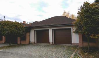 Close-up of modern detached house with garage photo