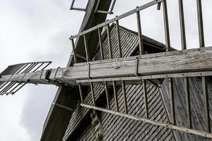 Dutch windmill on a sunny and cloudy day photo