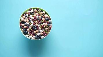 top view of mixed beans in a bowl . video