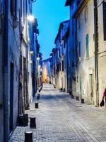 narrow street with houses in Italy photo