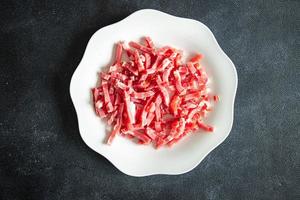 bacon small raw pieces pork meat fumees cuire fresh healthy meal food snack diet on the table copy space food photo