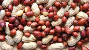 Processed pea nuts on table top view video