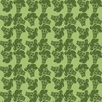 Seamless broccoli pattern. Doodle vector green broccoli icons. Vintage green broccoli pattern