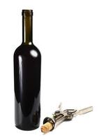 bottle with red wine and cork-screw photo