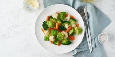Mix of boiled vegetables. Broccoli, carrots, cauliflower. Steamed vegetables for low-calorie diet