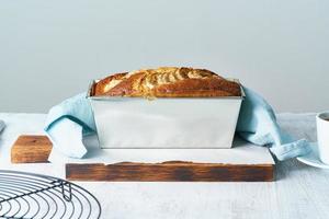 Banana bread in loaf pan. Cake with banana, traditional american cuisine photo