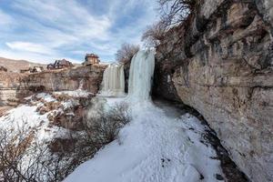 A large frozen waterfall. 3 cascading waterfall in Dagestan photo