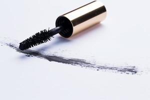 Mascara brush on white photo