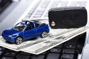 Toy car and banknotes photo