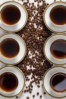 Cup and coffee beans photo