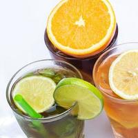 Cocktails with different citrus fruits photo