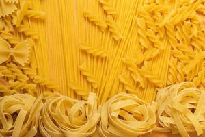 Various uncooked pasta photo