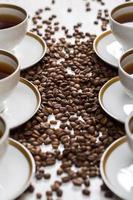 Cup and coffee beans photo