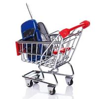 Car in shopping trolley photo