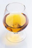 Glass of cognac photo
