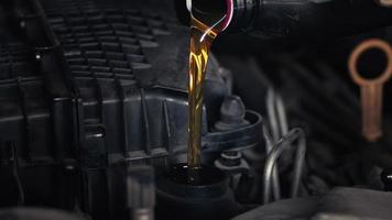 Engine Oil From A Plastic Bottle At The Repair Shop video