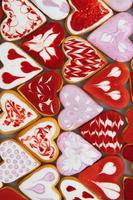 Valentine  day cookies. Heart shaped cookies for valentine day. Red and Pink Heart Shaped Cookies. Romantic seamless pattern with cookies hearts.
