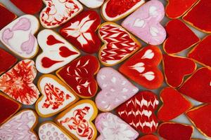 Valentine  day cookies. Heart shaped cookies for valentine day. Red and Pink Heart Shaped Cookies. Romantic seamless pattern with cookies hearts.