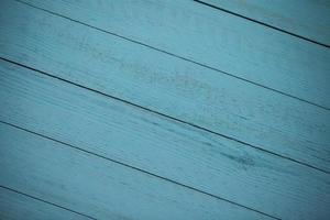 Vintage brown wood background texture with knots and nail holes. Old painted wood wall. Brown abstract background. Vintage wooden dark horizontal boards. Front view with copy space. photo