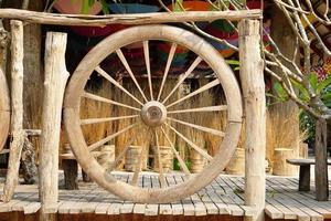 old wagon wheel in the park photo