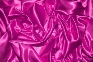abstract purple fabric background with soft waves photo